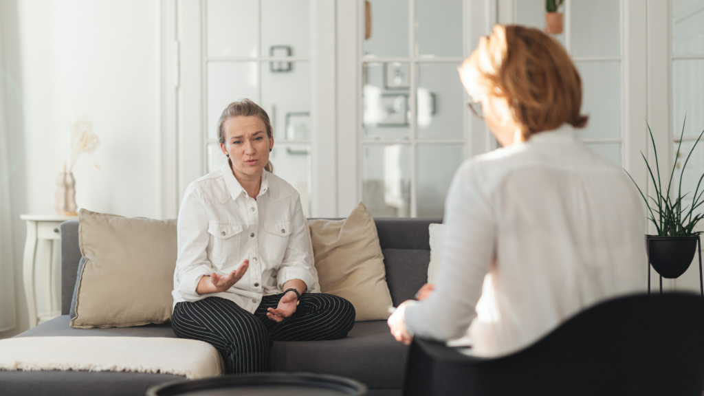 A woman expresses her concerns to a female therapist at Assured Psychology who also happens to be one of Calgary's top counsellors.